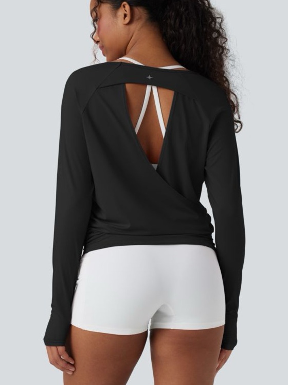 NWOT HALARA Cut-Out Back Thumb Hole Ruched Relaxed Yoga Long Sleeve Top Black